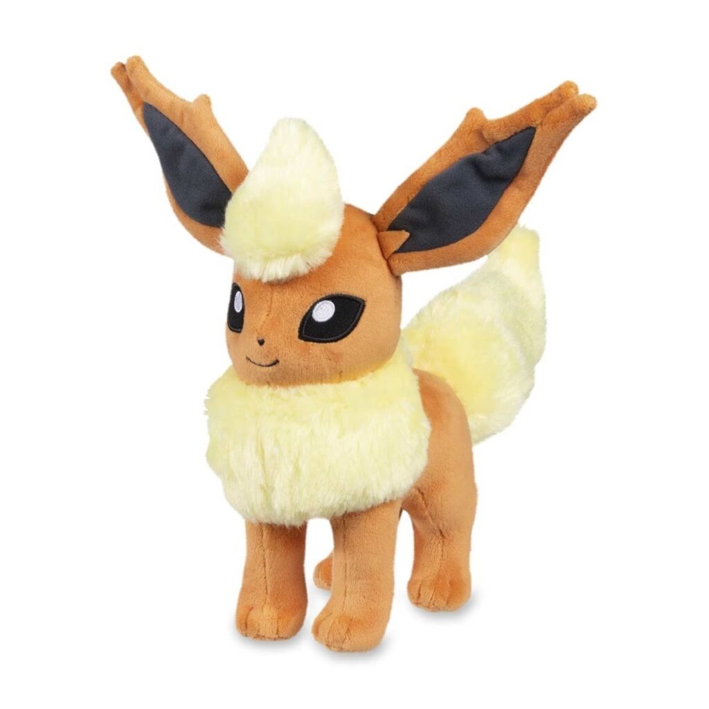 c42baf03-4377-5383-a9b9-2a13a1366278-1024x1024-1.jpg Flareon Poké Plush – 11 ½ In. - Image 1